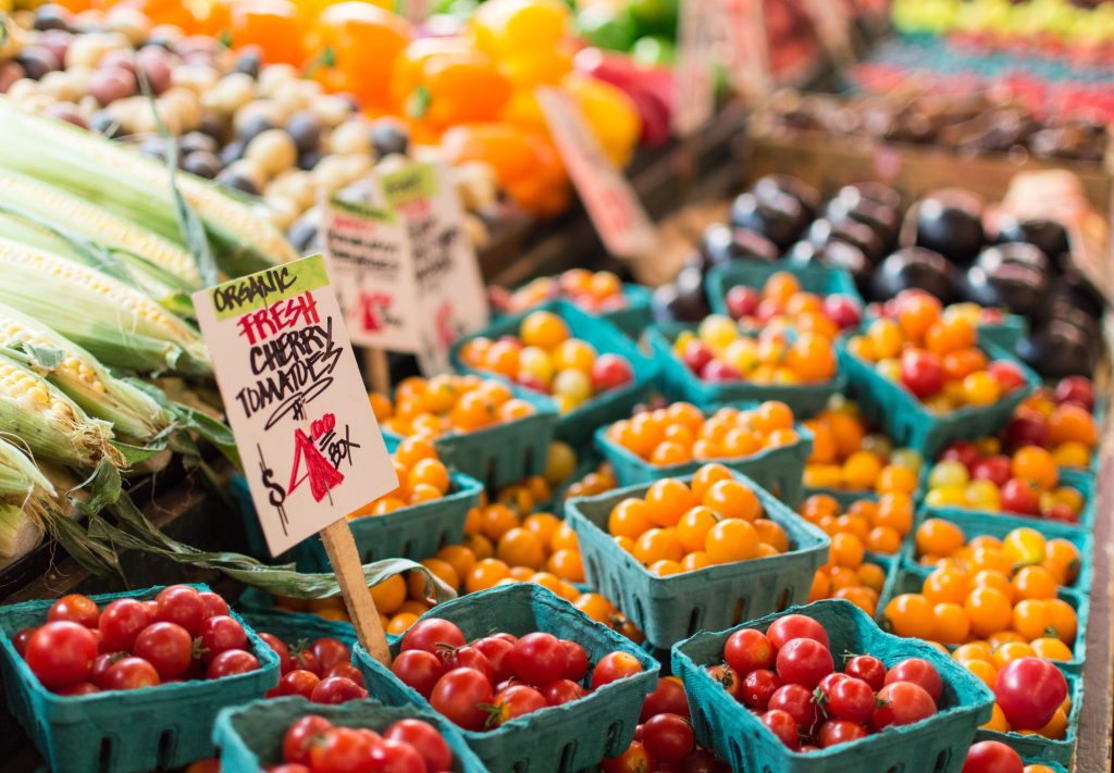 Organic cherry tomatoes for sale at a market